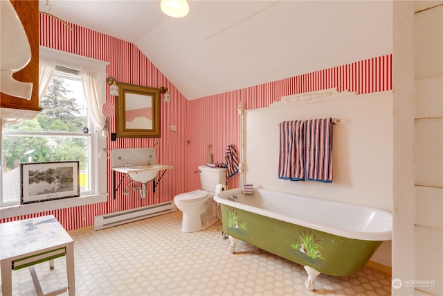 bathroom with toilet, a tub to relax in, vanity, a baseboard radiator, and lofted ceiling