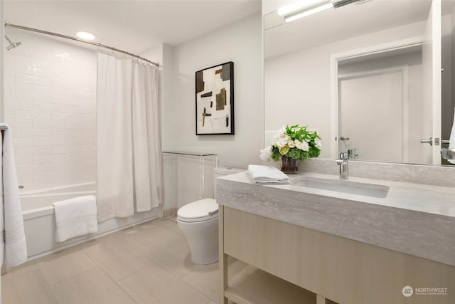 full bathroom featuring toilet, shower / bath combo, vanity, and tile flooring