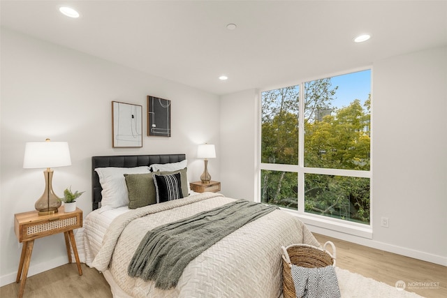 bedroom with light hardwood / wood-style floors