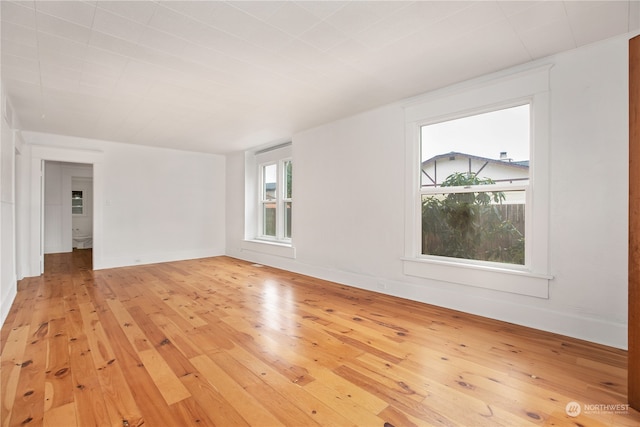 unfurnished room featuring light wood-type flooring