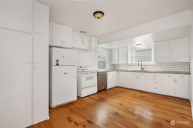 kitchen featuring white appliances, light wood-type flooring, and white cabinetry