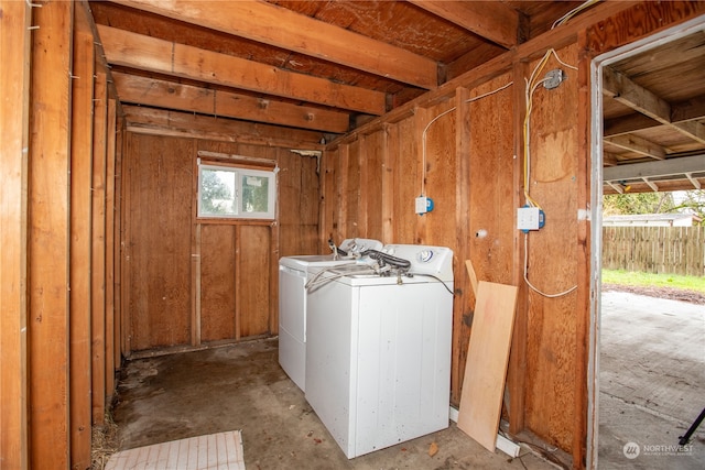 washroom featuring a healthy amount of sunlight and washer and dryer