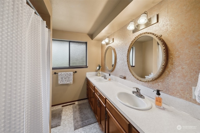 bathroom with tile flooring and double sink vanity