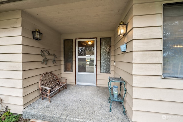 doorway to property featuring a patio area