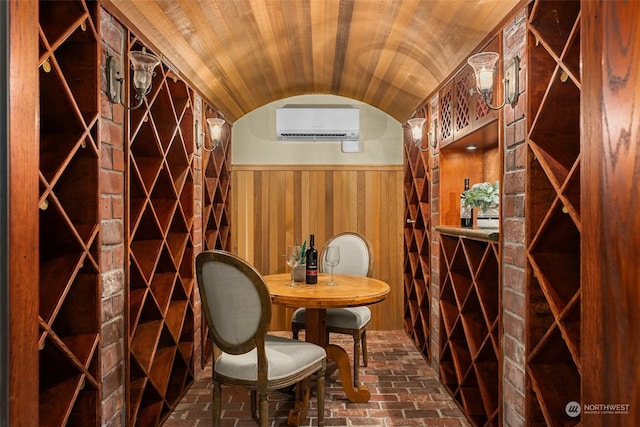 wine room featuring an AC wall unit, vaulted ceiling, wooden walls, and wooden ceiling