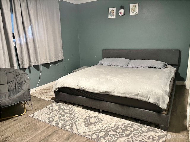 bedroom featuring light hardwood / wood-style flooring