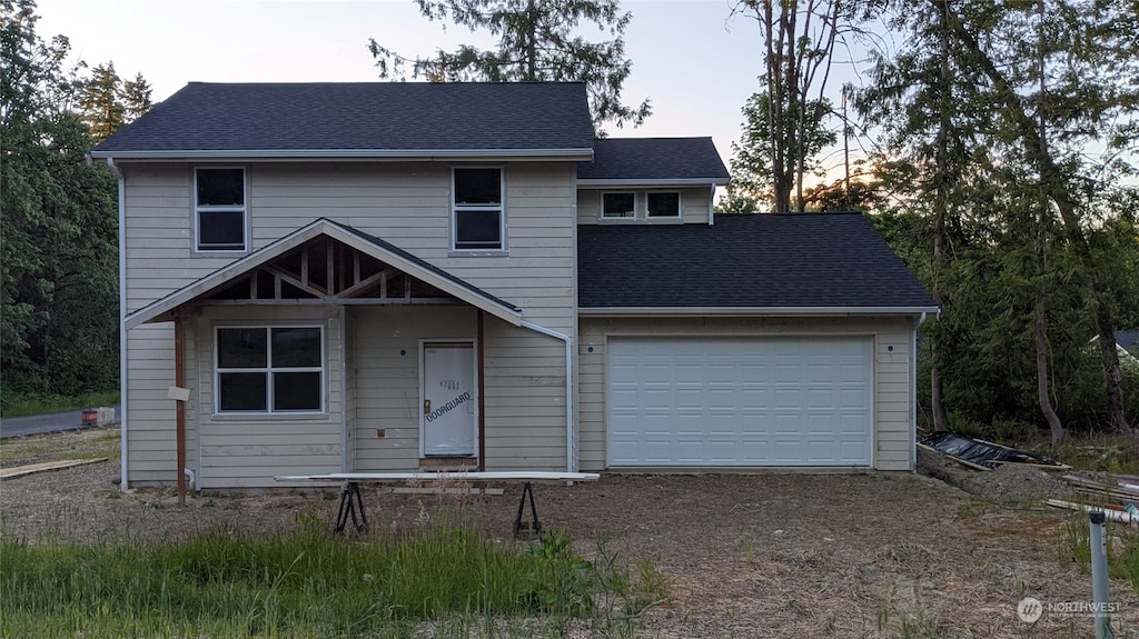 view of front of home with a garage