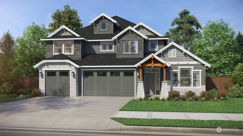 craftsman-style home with a front yard and a garage