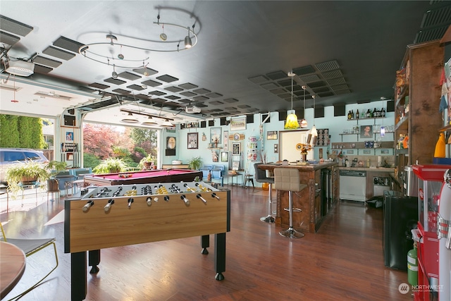 game room featuring dark hardwood / wood-style floors and billiards