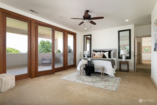 bedroom with light carpet, access to outside, french doors, and ceiling fan