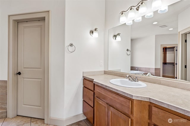 bathroom featuring vanity and tile patterned flooring