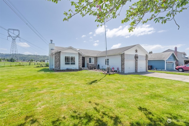 ranch-style house with a front yard and a garage