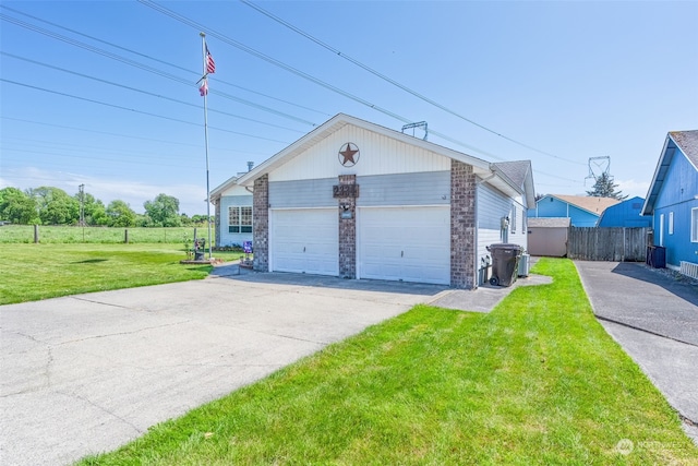 garage with a yard