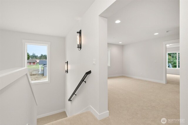 staircase featuring recessed lighting, carpet flooring, and baseboards