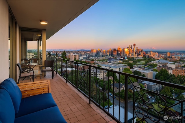 view of balcony at dusk