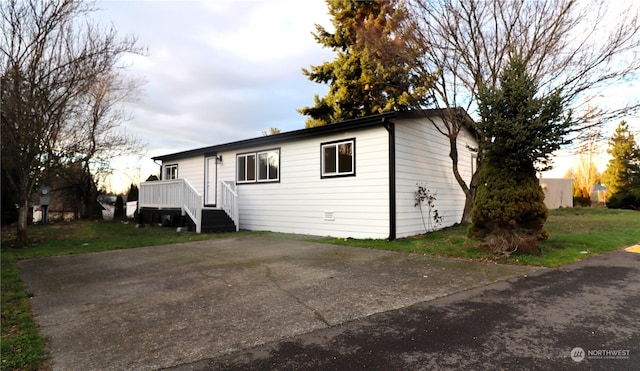 view of front of house with a wooden deck