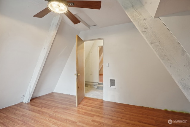 additional living space featuring light wood-type flooring and ceiling fan