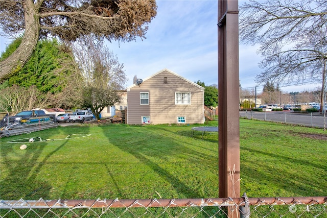 view of yard featuring a trampoline