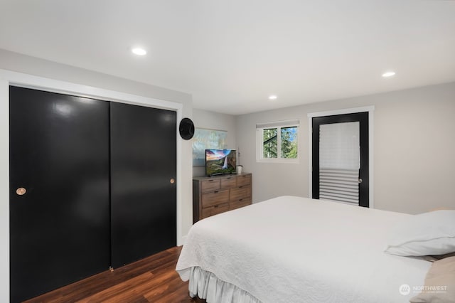 bedroom featuring dark hardwood / wood-style floors