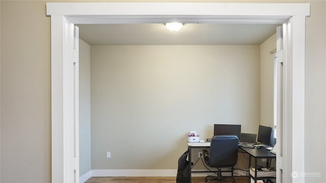 office area with hardwood / wood-style floors