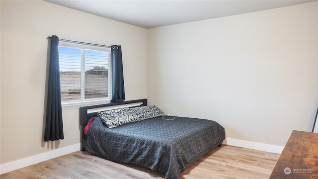 bedroom featuring light hardwood / wood-style floors