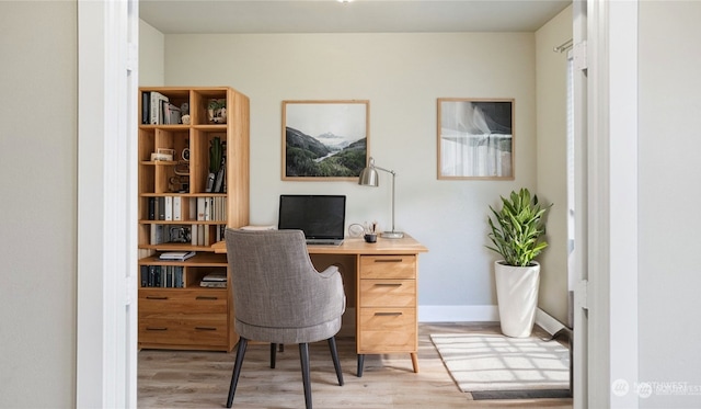 office space featuring light wood-type flooring