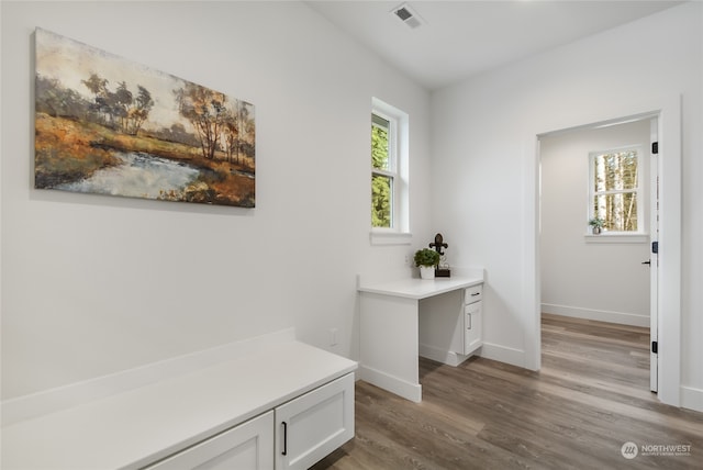 hallway featuring hardwood / wood-style floors