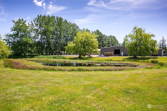 view of yard with a water view