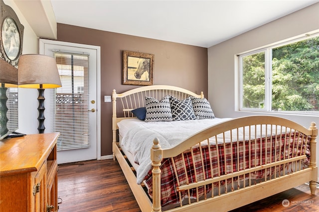 bedroom featuring dark wood-type flooring