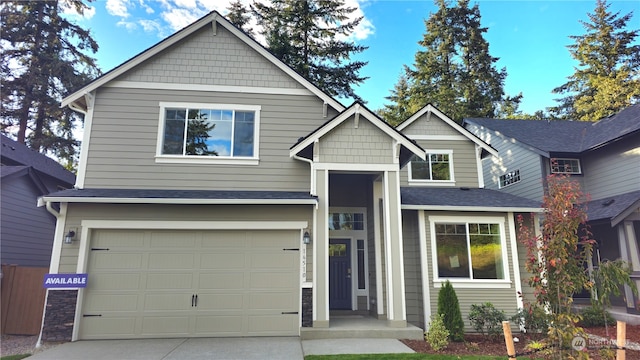 craftsman-style home with a garage