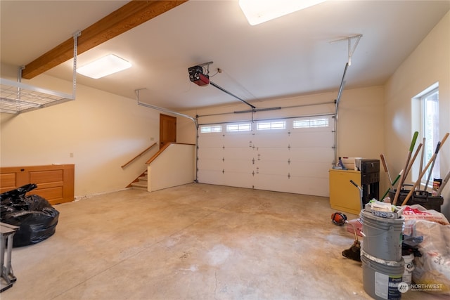 garage featuring a garage door opener