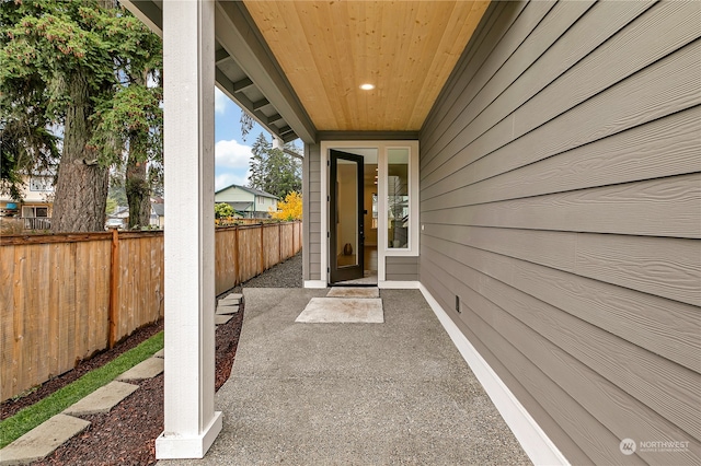 property entrance featuring a patio area