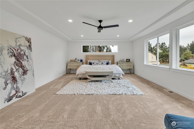 carpeted bedroom featuring ceiling fan