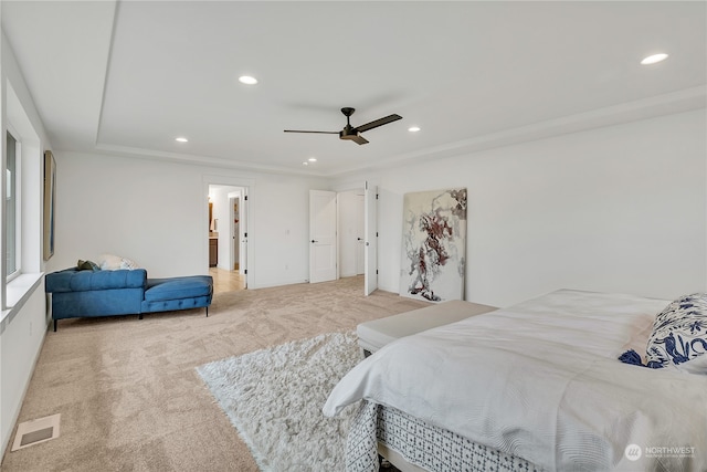 bedroom featuring light colored carpet and ceiling fan