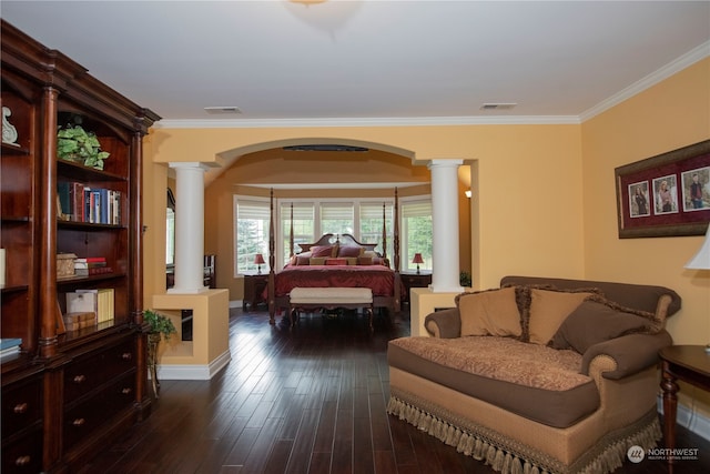 living room with dark hardwood / wood-style floors, ornamental molding, and ornate columns