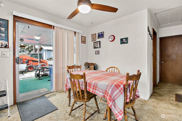 dining room featuring ceiling fan