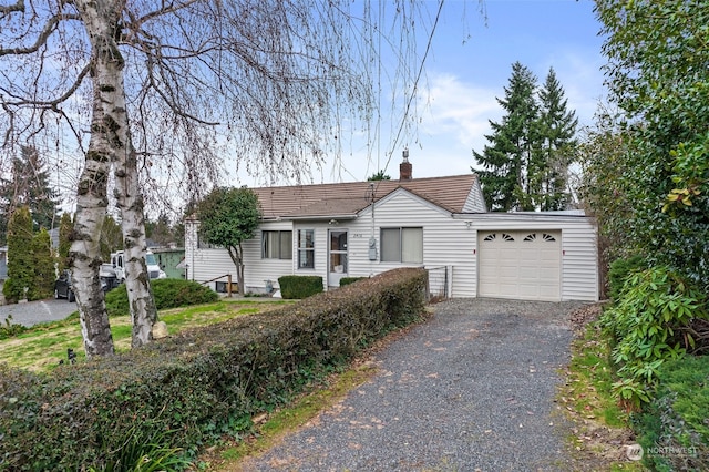 single story home with a garage