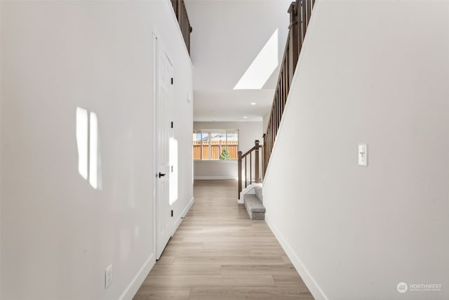 hallway featuring light hardwood / wood-style floors