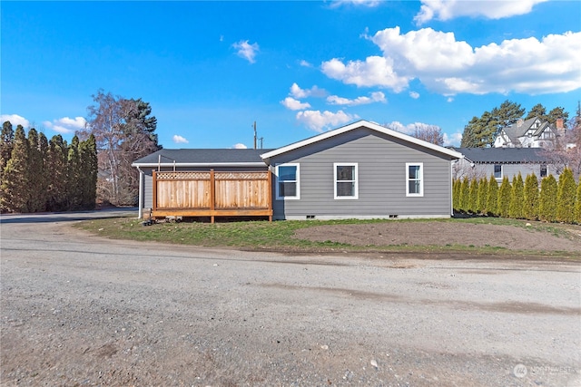 view of front of property featuring a deck