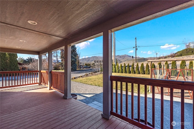 wooden terrace with a mountain view