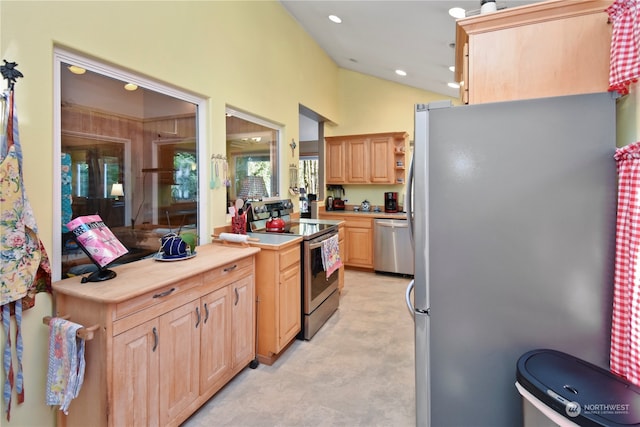 kitchen with light brown cabinetry and stainless steel appliances