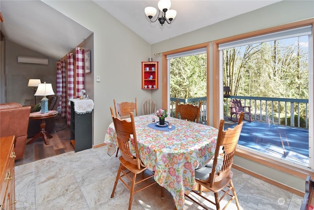 tiled dining space featuring a wall unit AC, a notable chandelier, and vaulted ceiling