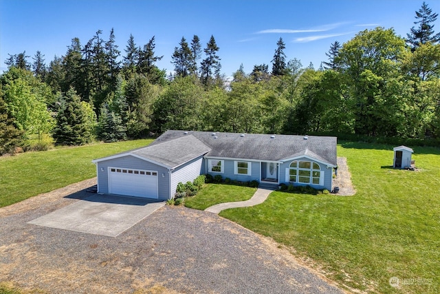 single story home featuring a garage and a front lawn