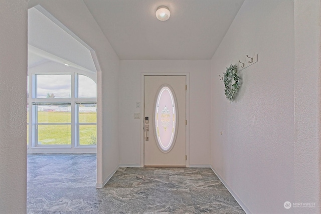 entrance foyer featuring tile flooring