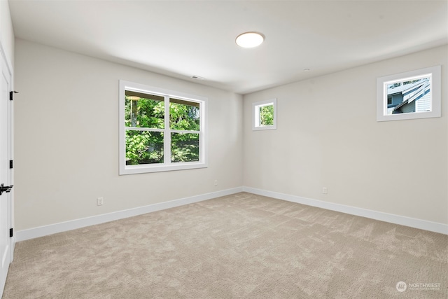 view of carpeted spare room