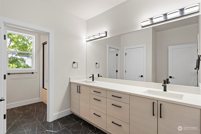 bathroom featuring dual vanity and tile patterned floors