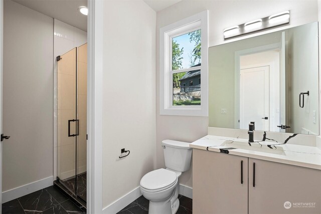 bathroom featuring vanity, toilet, tile patterned flooring, and walk in shower