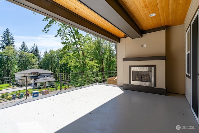 view of patio with a balcony