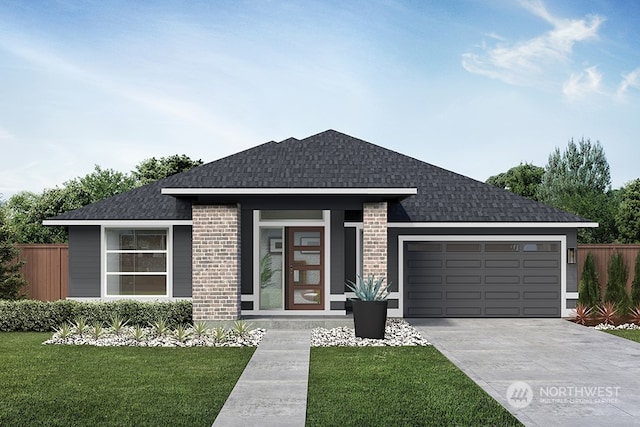 prairie-style home featuring a front lawn and a garage