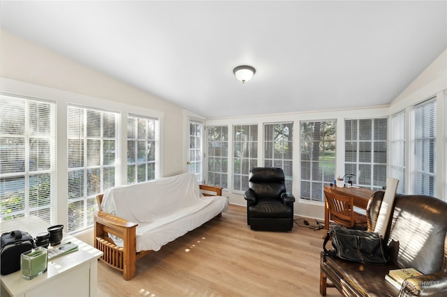 sunroom with vaulted ceiling